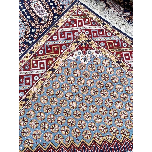 68 - PURE SILK PAISLEY DESIGN CARPET, 423cm x 310cm.