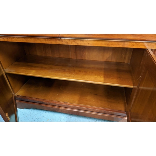 345 - GRANGE SIDEBOARD, 209cm L x 98cm x 55cm with three drawers above three panelled doors enclosing shel... 