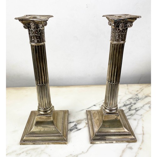 20 - SILVER CANDLESTICKS, a pair, corinthian column, by Lee and Wigfull, Sheffield 1912, 28cm H. (2)