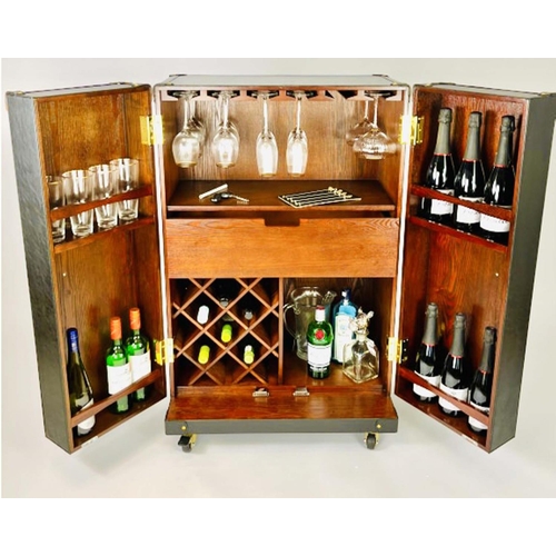 337 - DRINKS CABINET, 112cm high, 71cm wide, 46cm deep, 147cm open, in the form a steamer cabinet, real le... 