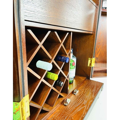 337 - DRINKS CABINET, 112cm high, 71cm wide, 46cm deep, 147cm open, in the form a steamer cabinet, real le... 