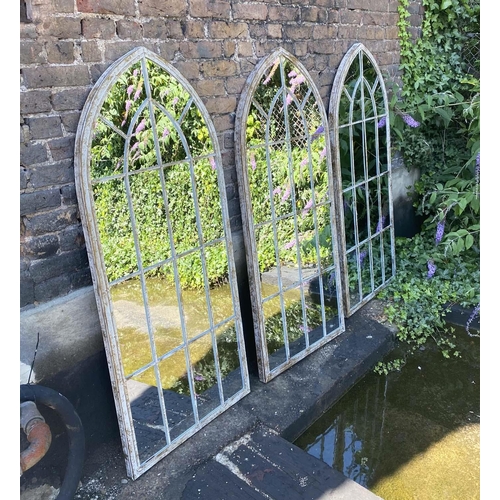 323 - ARCHITECTURAL GARDEN MIRRORS, set of three, 160cm high, 67cm wide, Gothic style with overlaid glazin... 