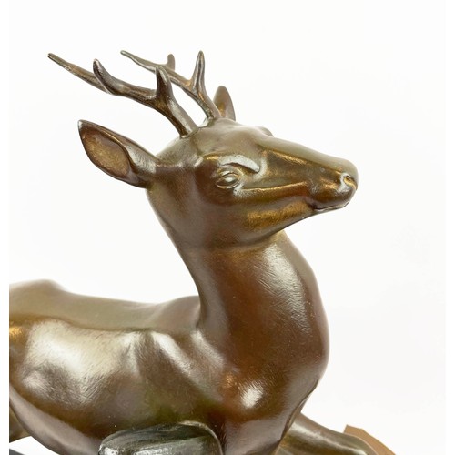 29 - A SOLEALL BRONZE DEER, Art Deco on black variegated marble base, 52cm L x 41cm H.