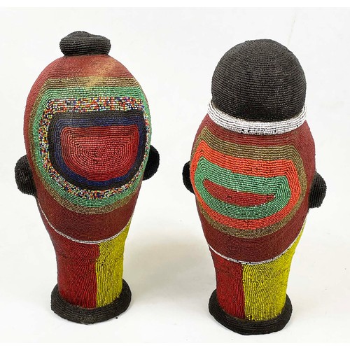 28 - IFEE BEADED HEADS, a pair, from Nigeria. 48cm H