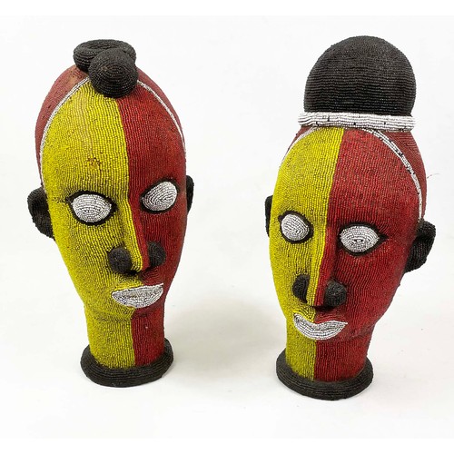 28 - IFEE BEADED HEADS, a pair, from Nigeria. 48cm H