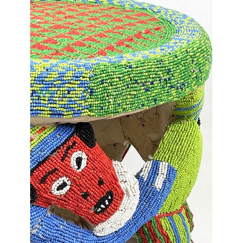 33 - BEADED BAMUN STOOL, from Cameroon. 58CM Rd x 51cm H