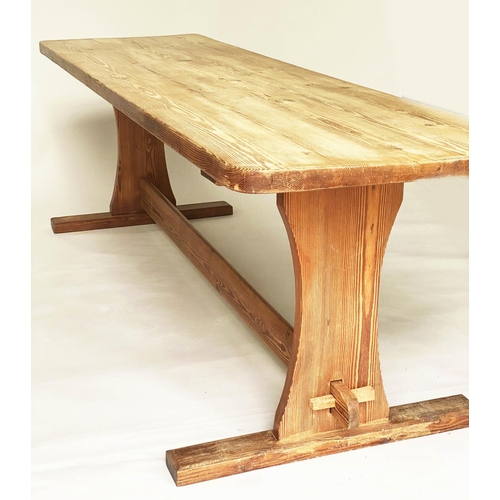 207 - HARVEST DINING TABLE, mid 20th century Oregon pine rectangular with trestle ends and stretcher suppo... 