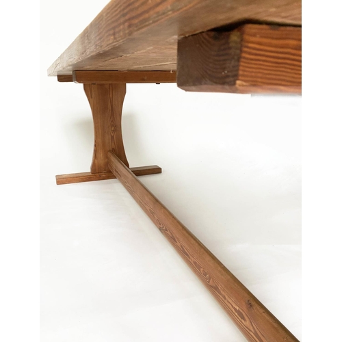 207 - HARVEST DINING TABLE, mid 20th century Oregon pine rectangular with trestle ends and stretcher suppo... 