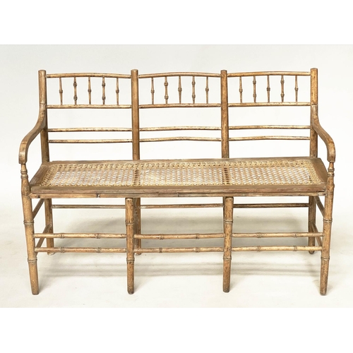 173 - FAUX BAMBOO HALL SEAT, 19th century English carved faux bamboo framed with down swept arms and cane ... 