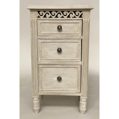 114 - BEDSIDE CHESTS, a pair, French style grey painted each with three drawers and pierced frieze, 40cm x... 