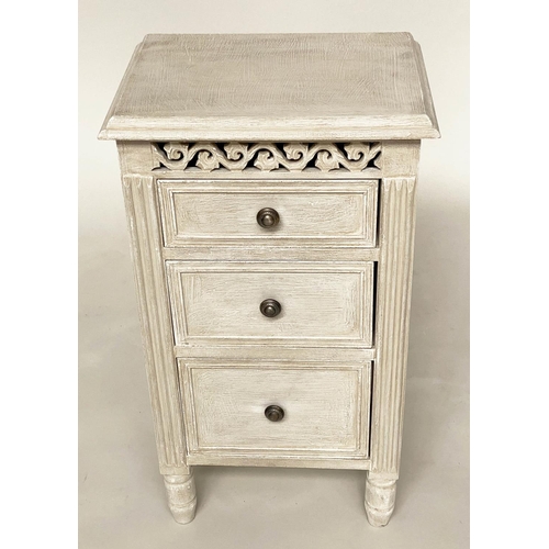 114 - BEDSIDE CHESTS, a pair, French style grey painted each with three drawers and pierced frieze, 40cm x... 