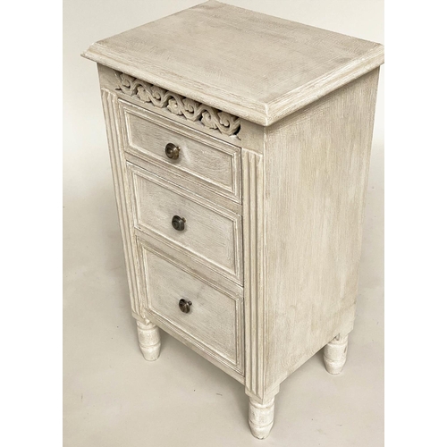 114 - BEDSIDE CHESTS, a pair, French style grey painted each with three drawers and pierced frieze, 40cm x... 