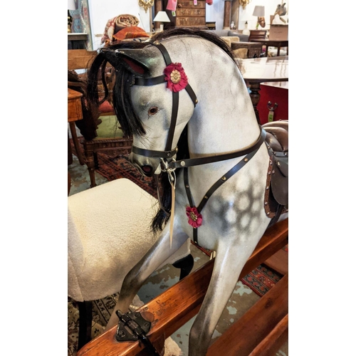 134 - ROCKING HORSE, dapple grey painted on a pine base, 135cm W.