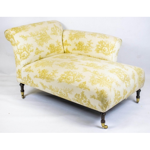 149 - CHAISE LONGUE, 74cm H x 137cm L x 87cm, yellow toile du jouy fabric upholstered on brass castors.