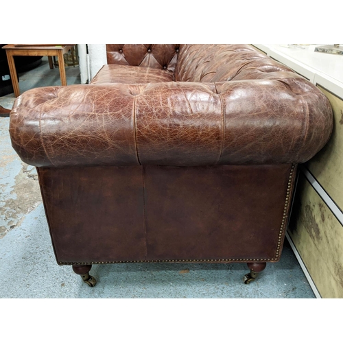 155 - CHESTERFIELD STYLE SOFA, tan button back leather upholstered, studded detail. 220cm x 90cm x 75cm.