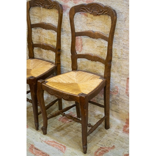 168 - DINING CHAIRS, 98cm H x 45cm W, a set of six Louis XV style oak with drop in rush seats. (6)