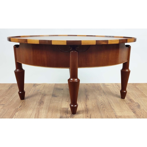 179 - LOW TABLE, oval top mahogany with ash and ebony inlay and shaped supports, 93cm L x 60cm x 48cm H.