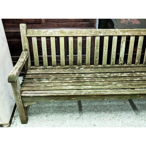 183 - GARDEN BENCH, 180cm x 90cm H, weathered with moss.