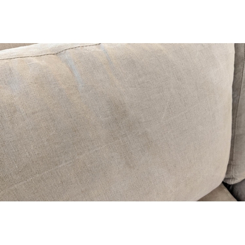 185 - SOFA, 197cm x 90cm, Edwardian in a linen fabric with square tapering supports and castors.