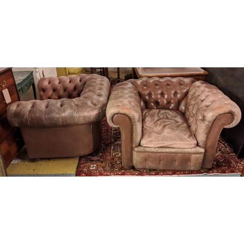 197 - CHESTERFIELD ARMCHAIRS, a pair, each 115cm W x 77cm H x 85cm D, brown buttoned leather. (2)