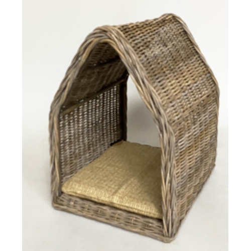 286 - RATTAN DOG BED, woven heavy duty and arched, 72cm x 82cm H x 60cm.