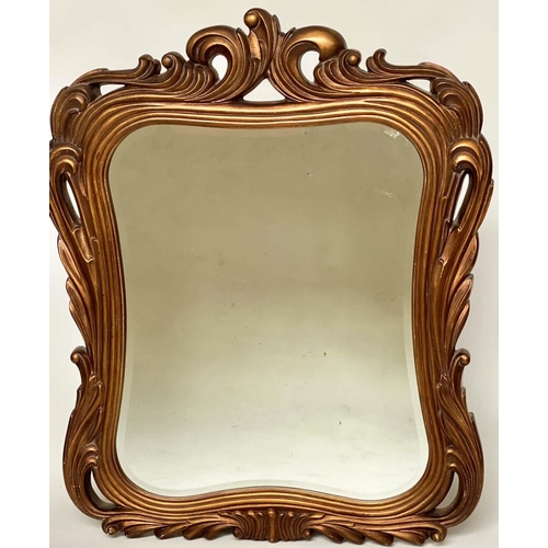 287 - WALL MIRROR, Italian style chantilly gilded deep scrolling frame and shaped bevelled mirror plate, 1... 