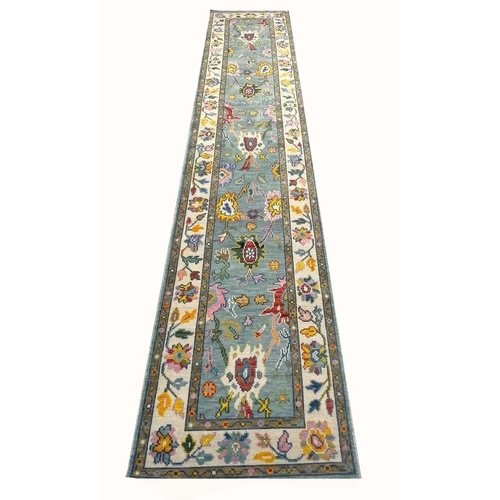 64 - CONTEMPORARY OUSHAK RUNNER, 394cm x 79cm.