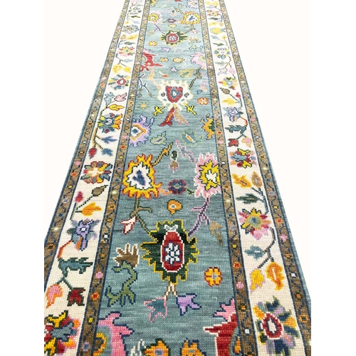 64 - CONTEMPORARY OUSHAK RUNNER, 394cm x 79cm.