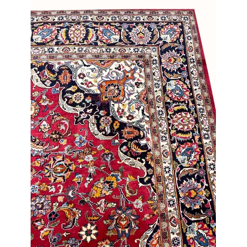 66 - FINE PERSIAN MASHAD CARPET, 335cm x 250cm.