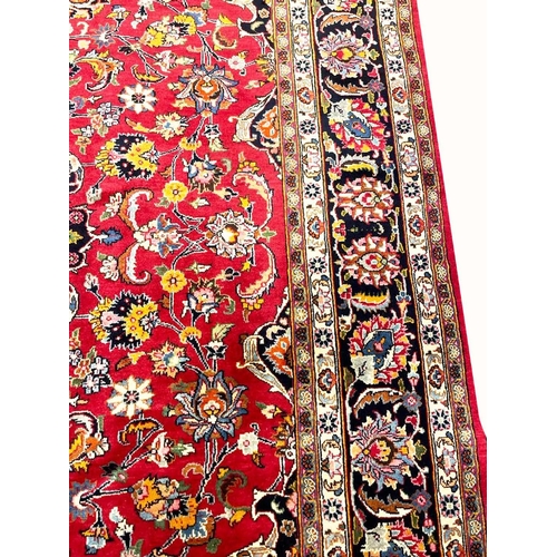 66 - FINE PERSIAN MASHAD CARPET, 335cm x 250cm.