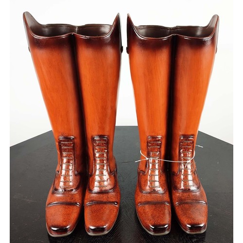 421 - STICK STANDS, a pair, faux riding boots design, painted resin, 48cm H each. (2)