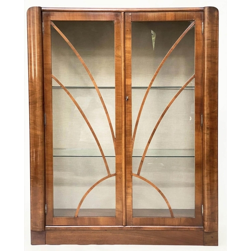 112 - ART DECO DISPLAY CASE, early 20th century figured walnut with two glass panelled doors, sides and sh... 