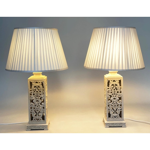 120 - TABLE LAMPS, a pair, grey painted pierced bases with shades, 60cm H. (2)