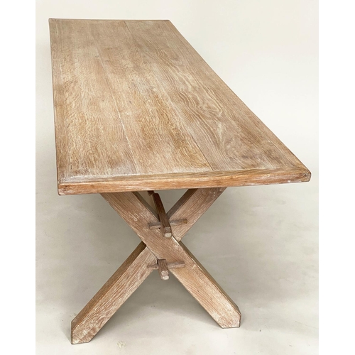 122 - FARMHOUSE TABLE, 18th century style limed and bleached oak with X trestle and shaped stretcher, the ... 