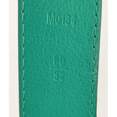 7 - LOUIS VUITTON CROCODILE BELT, green exotic leather with gold tone initials at the front, size 80/32,... 