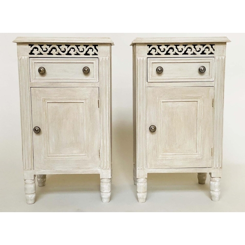 144 - BEDSIDE CABINETS, a pair, French traditionally grey painted each with drawer, panelled door and pier... 