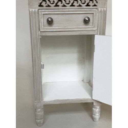 144 - BEDSIDE CABINETS, a pair, French traditionally grey painted each with drawer, panelled door and pier... 