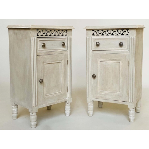 144 - BEDSIDE CABINETS, a pair, French traditionally grey painted each with drawer, panelled door and pier... 