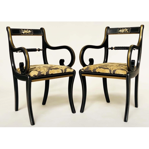 145 - ARMCHAIRS, a pair, Regency design, gilt and lacquered with 'Safari' fabric upholstered cushions (And... 