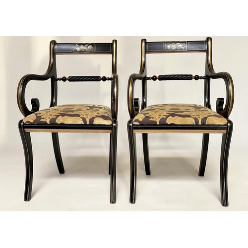 145 - ARMCHAIRS, a pair, Regency design, gilt and lacquered with 'Safari' fabric upholstered cushions (And... 