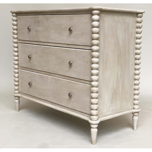 150 - COMMODE, shaker style traditionally grey painted with three long drawers, and bobbin turned pilaster... 