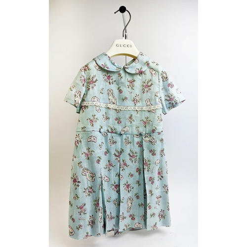 24 - GUCCI PROVANCE DRESS, size 36/4 Y, made in Italy, cotton, with dogs flower and masks print against p... 