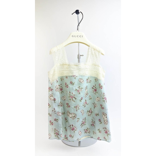 27 - GUCCI PROVANCE TOP, size 36/4 Y, made in Italy, linen with cotton lining, with dogs flower and masks... 