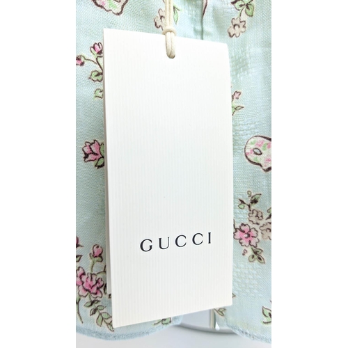 27 - GUCCI PROVANCE TOP, size 36/4 Y, made in Italy, linen with cotton lining, with dogs flower and masks... 