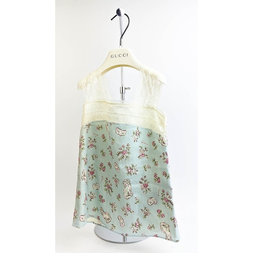 29 - GUCCI PROVANCE TOP, size 36/4 Y, made in Italy, linen with cotton lining, with dogs flower and masks... 