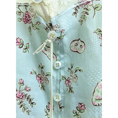 29 - GUCCI PROVANCE TOP, size 36/4 Y, made in Italy, linen with cotton lining, with dogs flower and masks... 