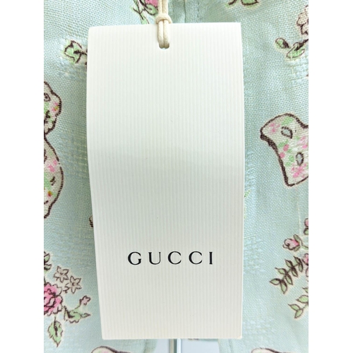 29 - GUCCI PROVANCE TOP, size 36/4 Y, made in Italy, linen with cotton lining, with dogs flower and masks... 