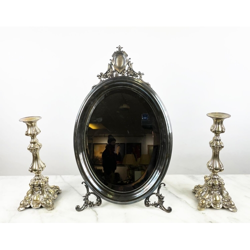 44 - OVAL DRESSING TABLE MIRROR, silver plated with bevelled plate and a pair of plated candlesticks, 31c... 