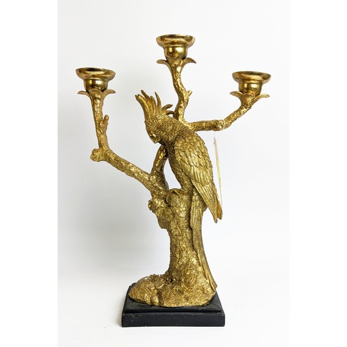 412 - FIGURAL CANDLESTICKS, in the form of cockatoos, gilt textured finish three branch form, black bases,... 