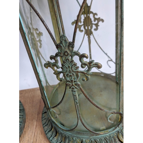 417 - STORM LANTERNS, a pair, Regency style, faux verdigris finished metal and glazed, 65cm H.